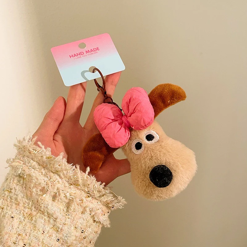 Plush Dog Head Keychain with Pink Bow
